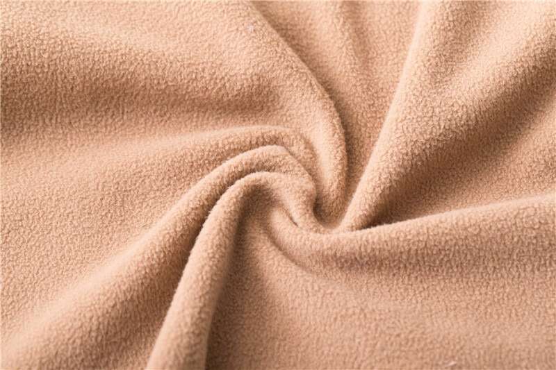 Close-up of peach-colored polar fleece